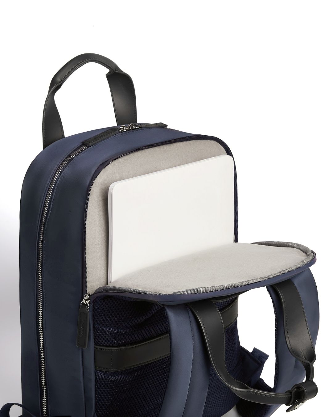 Navy blue backpack with a clear front pocket on a white background
