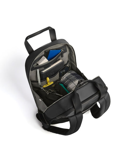 Black backpack with compartments on a white background